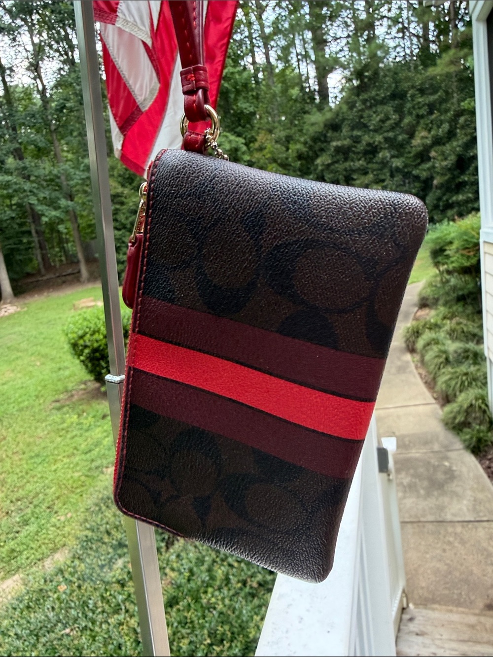 COACH Signature Stripe Zip Wristlet in Brown and Red - Picture 8 of 16